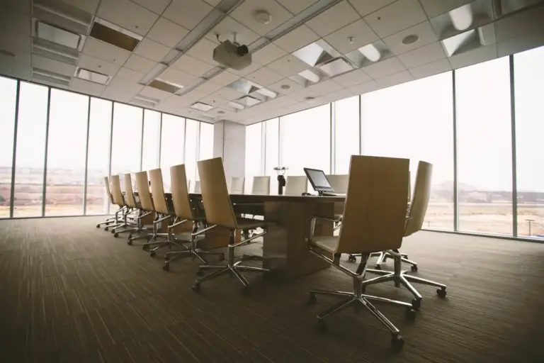 Image of an empty board table in a room.